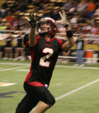 Seth Guyer is about to make a catch during the Pirates second touchdown drive.