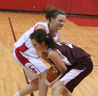Taylor Heitman battles for the ball with Kamiah's Kyndahl Ulmer, granddaughter of Cottonwood's Ingrid Mader.