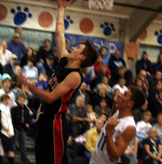 Beau Schlader scores a lay-up against Grangeville.