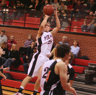 Devin Schmidt puts up a jump shot against Kendrick.