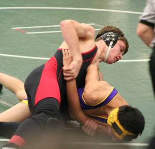 Kade Perrin works the arm as he attempts to turn this Cascade wrestler over for the pin.