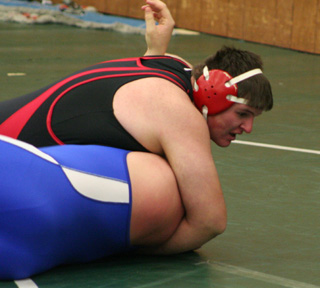 Mitch Jungert beat all his opponents by pin in the first period, including this Orofino wrestler, at the Potlatch Tournament.