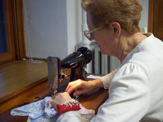 Sister Placida Wemhoff at her forties-era Singer sewing machine.