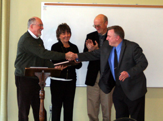 Lyle Wirtanen is presented the award by representatives of the 3 state organizations that sponsor it.