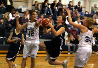 Rachel Wemhoff got into the lane for a shot. At left is Brooke Schumacher