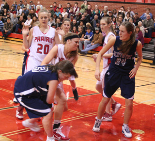 Prairie's MeShel Rad and Summit's Nicole Frei battle for the ball. Also shown are Kendal Schumacher, Callie Mader, Tanna Schlader and Savanah Prigge.