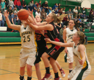 MaKayla Schaeffer and Kendal Schumacher go after an offensive rebound.