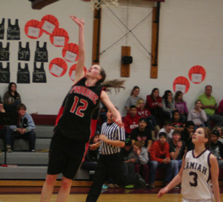 MaKayla Schaeffer scores a lay-up after a Kamiah turnover.