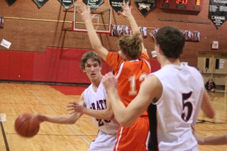 Justin Schmidt looks to make a pass to Seth Guyer.