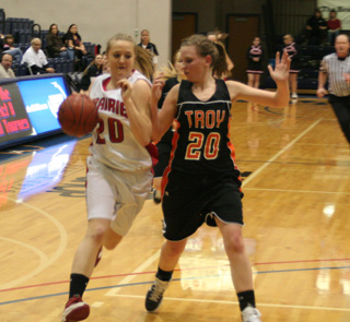 Kendall Schumacher drives past a Troy defender.