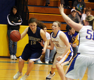 Rachel Wemhoff drives the baseline in Friday night's game.