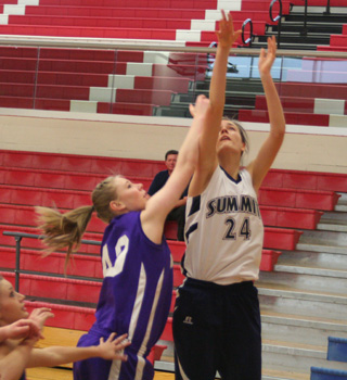 Savanah Prigge scores 2 of her 24 points against Garden Valley.