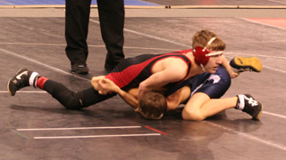 Alex Duman in his first round match at State.