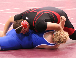 Mitch Jungert is about to turn this McCall-Donnelly wrestler for a pin.