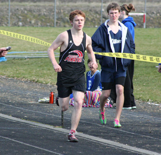 Brock Heath leads in the 1600 at the Lapwai Invitational.