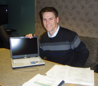 Dr. Andrew Gilbert, SMHC Chief Medical Officer, shows one of the new notebook computers that will be used by the healthcare providers during patient visits as the clinics begin initiating patient electronic medical records.