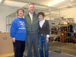 Historical Museum Curator Sister Wendy Olin, Director Sam Couch, and Museum Technician Shirley Gehring with new collection shelving.