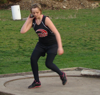 Taylor Heitman competed in the shot put. Photo by Kayla Raymond.