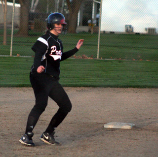 Kendall Schumacher at second after hitting an RBI double in the opener against Moscow on Monday.