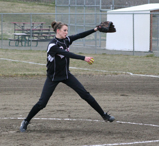 Leah Holthaus pitches for a win against Kamiah.