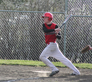 Silas Whitley takes a second to watch the flight of the ball on what turned out to be a game-ending homer against Timberline.