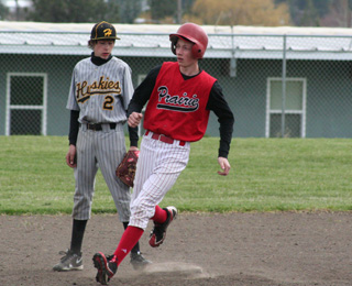 Casey Danly pulls into second with a double against Highland.