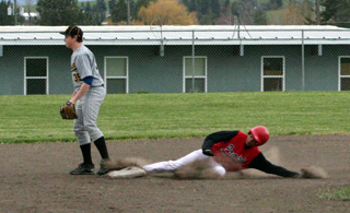 Tyler Hankerson slides into second base against Highland.