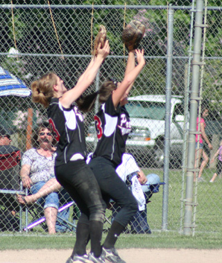 Second baseman Tanna Schlader and first baseman Meaghan Bruner collided as both attempted to catch a popup in the Genesee game on Friday. Bruner somehow managed to hang on to the ball for the out.