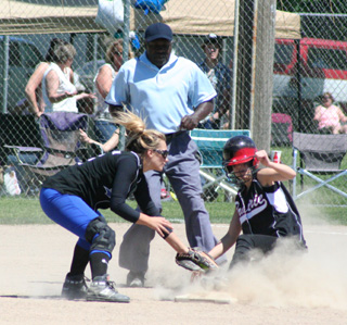 Leah Holthaus steals second in the Notus game.