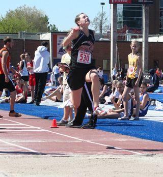 MaKayla Schaeffers face shows the effort she put into the triple jump where she placed 2nd at state. She was also 2nd in the long jump.