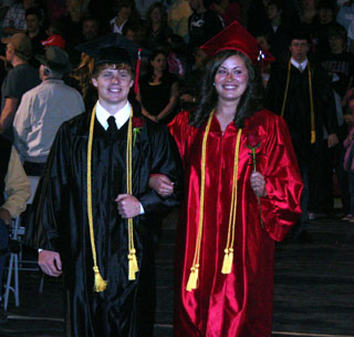 Brock Heath and Meaghan Bruner, who were named King and Queen of Sports a couple days earlier, march in the Processional.