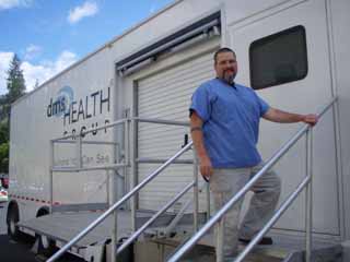 Heath Fox, Director, St. Marys and Clearwater Valley Hospitals Radiology Department, is pictured with the mobile MRI. Frequency of the diagnostic imaging is increasing at both facilities.