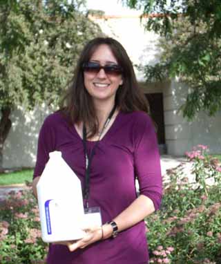Heidi Henson, pictured with a bottle of sunscreen, will also bring a derma scanner so women can check their skin for sun damage at the July 19th Ladies Night Out Fun in the Sun Komen event at the SMH Cottonwood Medical Clinic.