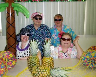 The SMH Dietary Depart are preparing fruit kabobs and sweet potato bars with lemonade for the July 19th Ladies Night Out., Pictured are Kevin Conger and Sally Seubert (front) and Angela Seubert and Cindy Schnider (back).