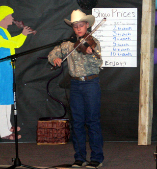 Elliot Marks, who played “Orange Blossom Special” as part of his performance won the 5-12 year old portion of the 2-Minute Talent Show.