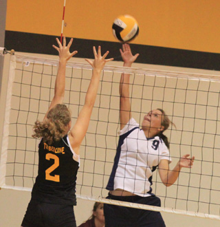 Brooke Schumacher tips the ball over in the match against Timberline at the Jamboree.