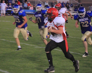 Troy Lorentz broke free for a 25-yard gain on this play. We believe thats Josh Roeper you can see behind Lorentz.