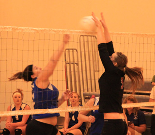 MeShel Rad walled off this spike attempt by Orofino at the Kendrick Tournament.