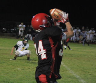 McCoy Hale makes a catch along the sidelines.
