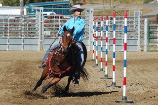 Callie Mader running the poles for a third place time on Sunday at the high school rodeo in Grangeville. Photo by Michelle Schaeffer.