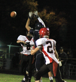Troy Lorentz just barely got his pass away to Justin Schmidt who caught it and turned it into a big gain.