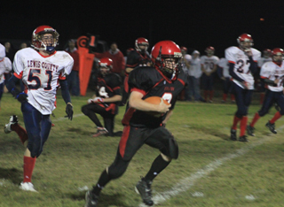 Troy Lorentz heads downfield for Prairies first touchdown of the game.