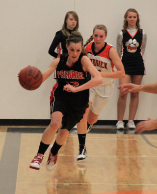 MaKayla Schaeffer heads up court for a lay-up after making a steal on the Kendrick end of the floor.