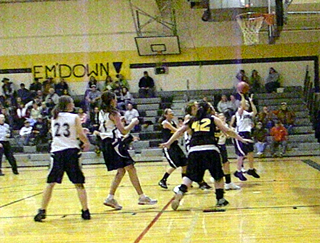 Action from the Summit game at Highland. Photo by Julie Schumacher.