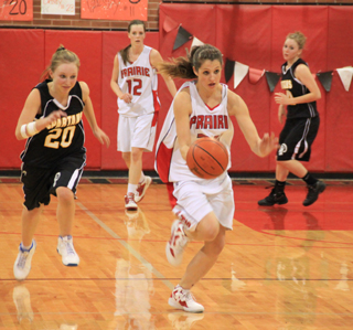 Shelby VonBargen heads downcourt after a steal. In the background is MaKayla Schaeffer.
