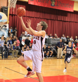 Justin Schmidt goes for the lay-up after a steal against Grangeville.