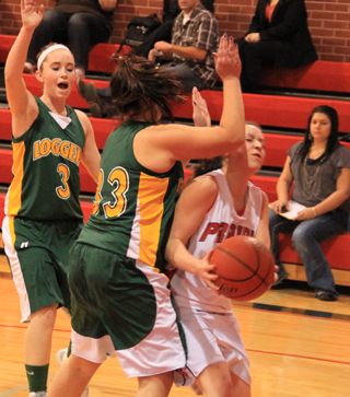 Megan Sigler takes an elbow to the face in the Potlatch game.