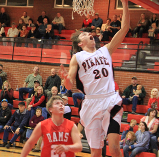 Justin Schmidt scores a lay-up against C.V.