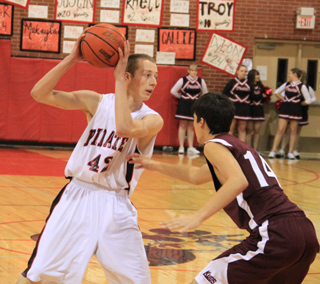 Casey Danly looks to make a pass in the Kamiah game.