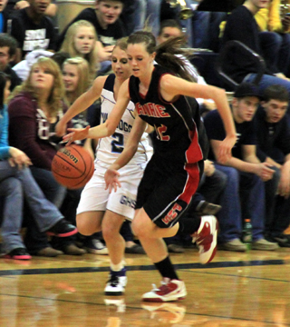 A Grangeville defender tries to knock the ball away from behind after MaKayla Schaeffer made a steal on their end.